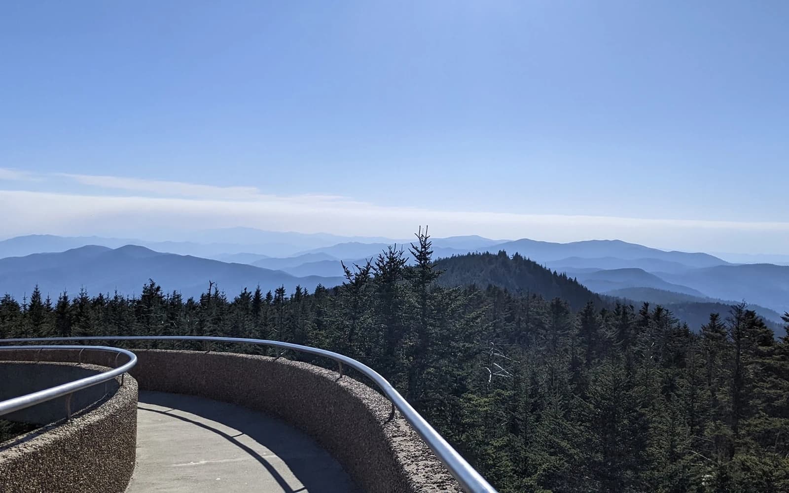 Mountain ridges and spruce-fir forest viewed from the Kuwohi observation tower